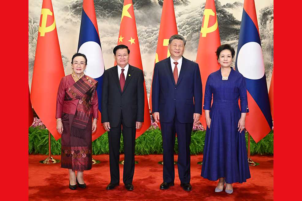 习近平同老挝人民革命党中央总书记、国家主席通伦举行会谈